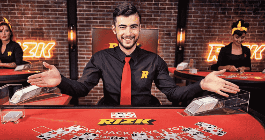 Rizk live casino blackjack table - dealer waiting for the decision of players 