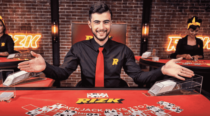 Rizk live casino blackjack table - dealer waiting for the decision of players