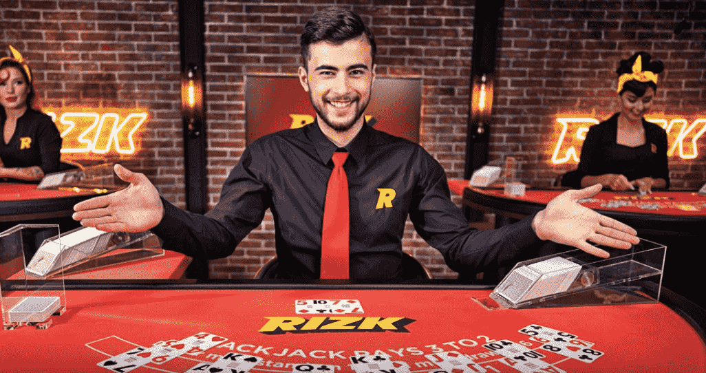 Rizk live casino blackjack table - dealer waiting for the decision of players